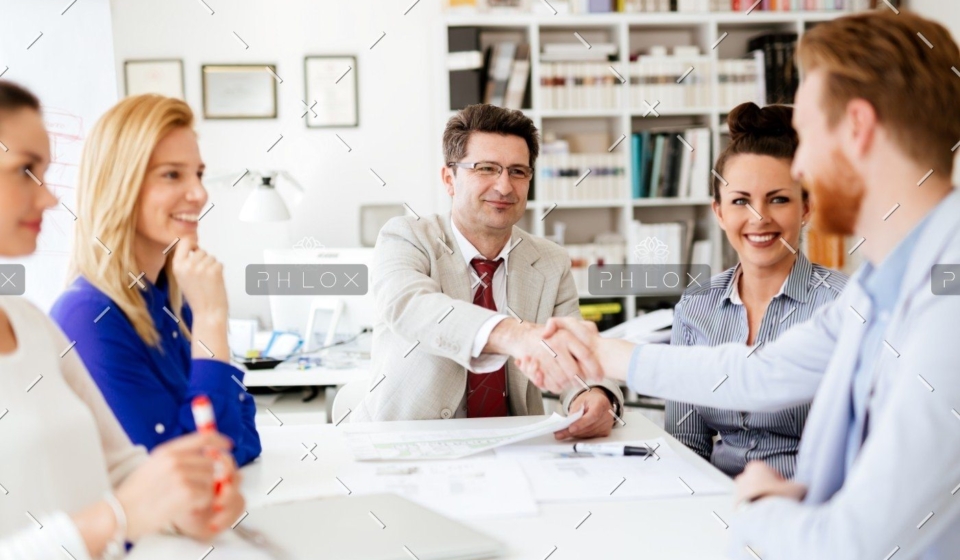 demo-attachment-655-group-of-business-people-working-as-team-in-9HPC4DK